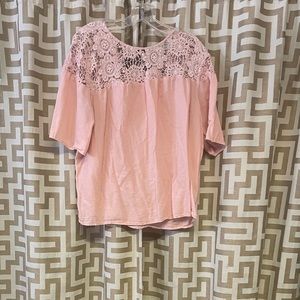 Pink short sleeve blouse.